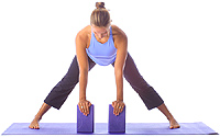 Yoga: Beginner standing wide leg forward fold with blocks 1