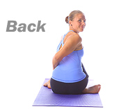 Yoga: Spinal twist with hands interlocked 2