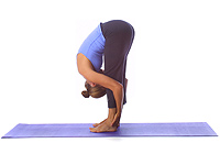Yoga: Standing forward fold, hands on calves or Achilles tendon 1